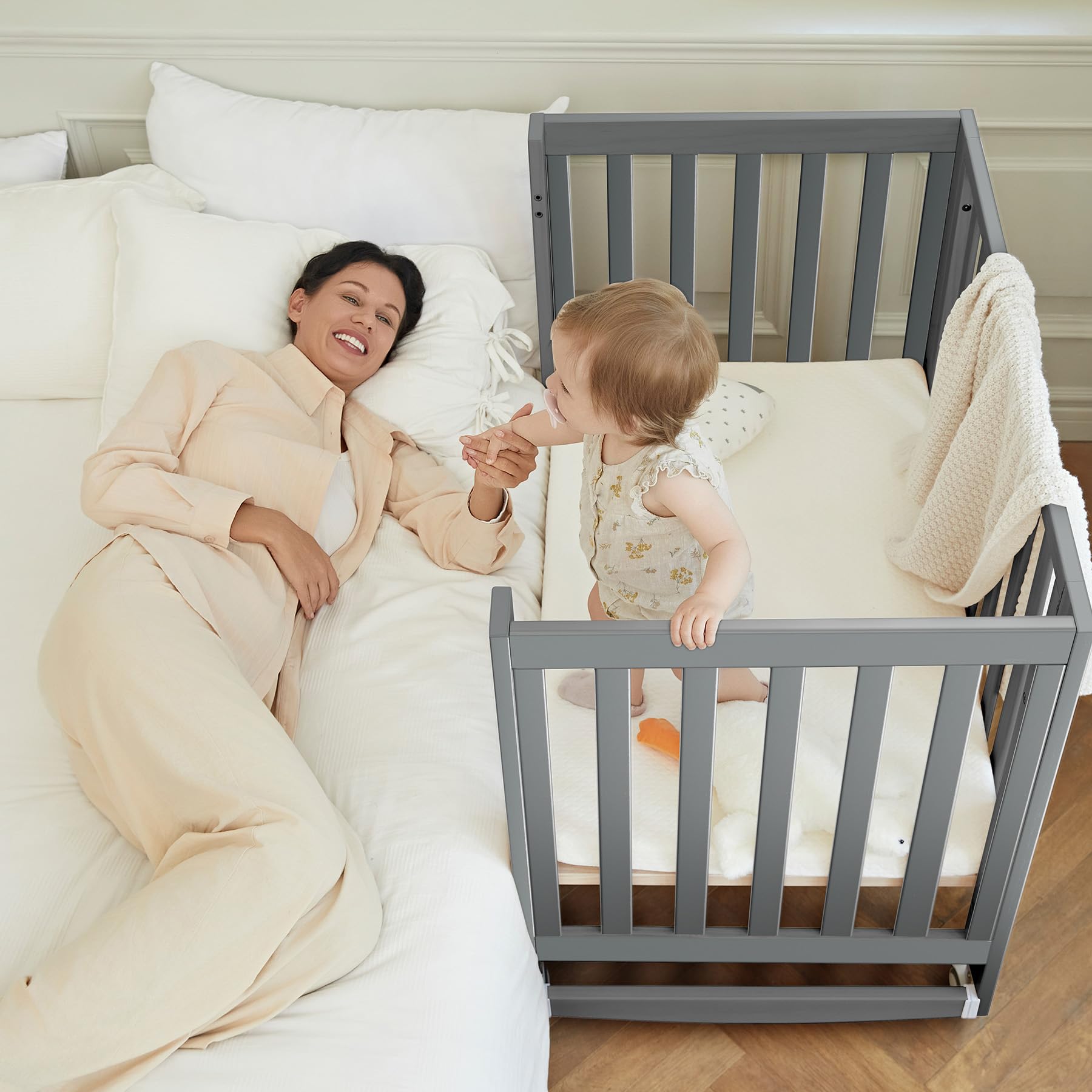 EvoNest Baby Crib, 11 in 1 Convertible Mini Crib with Wheels, 100% New Zealand Pinewood