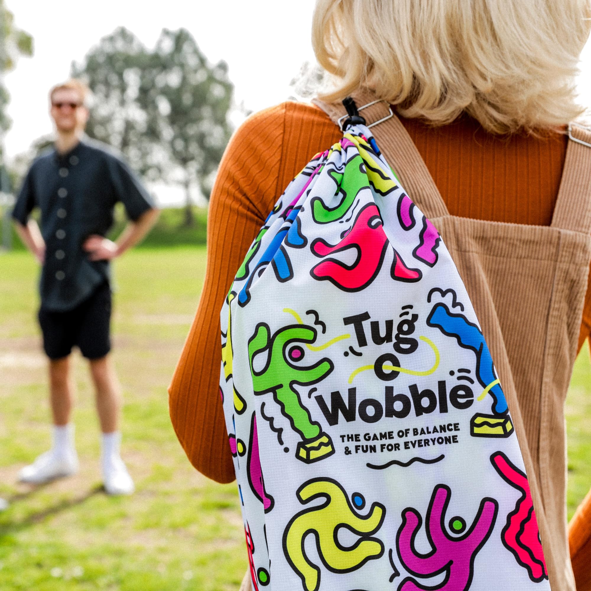 TUG O' WOBBLE: The Ultimate Balancing Game, Outdoor and Indoor Game, Fun for Everyone, Lawn Game for The Backyard, Park, or Yard with Carrying Bag, Family Friendly Gift